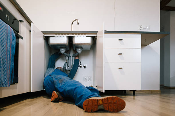 Professional Drain Cleaning technician working in Castroville, TX